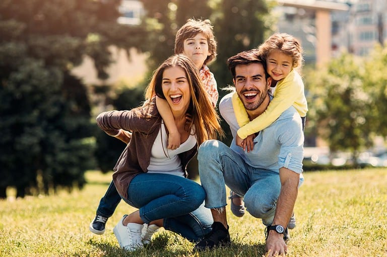 A family plays outside at a park in Minnesota.
