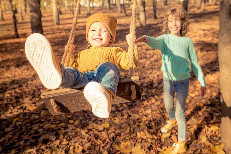 Kids on a swingset in St Peter Minnesota