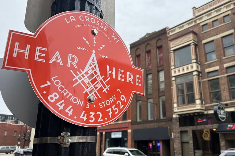 Step into the heart of La Crosse with the Hear, Here project, where every corner has a story to tell – in a way you've never heard before!