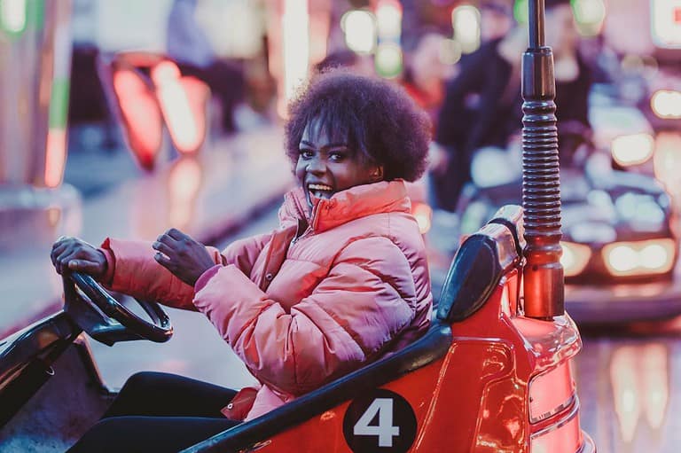 A woman having fun on Ice Bumper Cars in Virginia, Minnesota