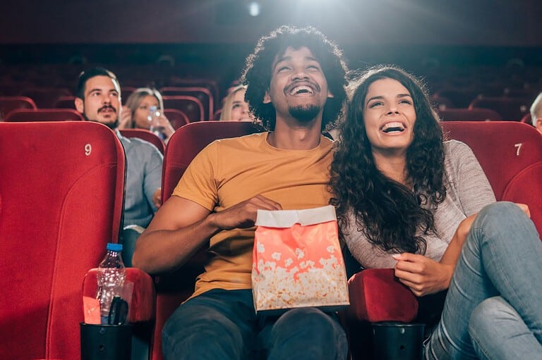 Couple enjoying a movie at Pop's Art Theater in Rochester, Minnesota
