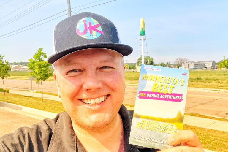 Travel with Jack and Kitty author and Midwest travel blogger Jack Norton at Rochester, Minnesota's ear of corn water tower.