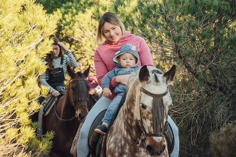 A mother and her baby got horseback riding in Wisconsin Dells