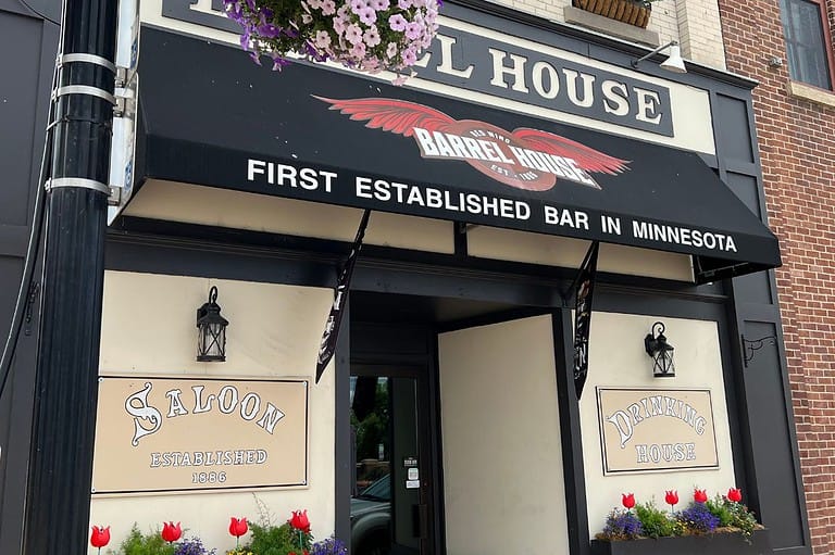 Exterior and sign outside of The Barrel House, Minnesota's First Bar in Red Wing.