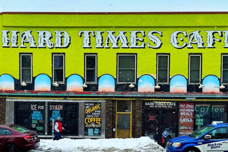 Exterior of Hard Times Cafe in Minneapolis on a snowy day.