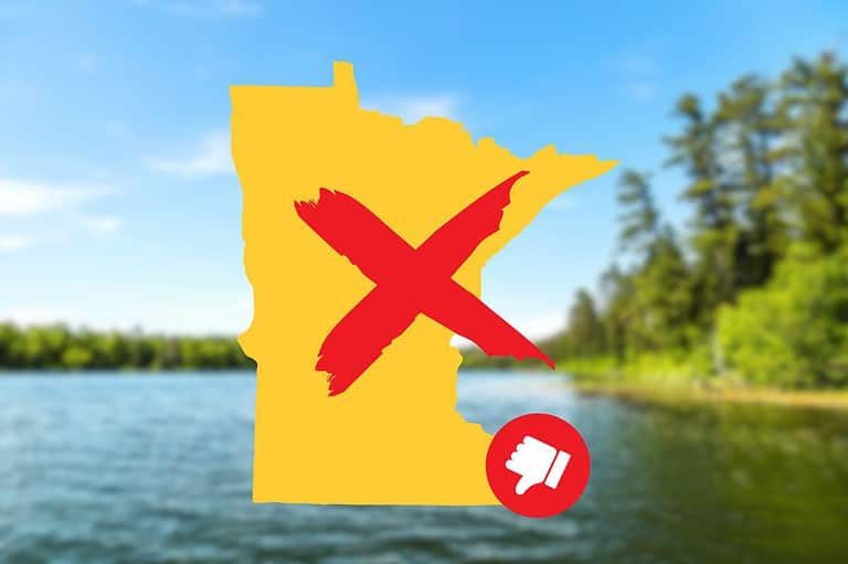 Photo of a lake scene with the state shape of Minnesota ina graphic on top. Think you know Minnesota? Think again! Discover the 10 cheeky reasons you should NEVER move to the Land of 10,000 Lakes.