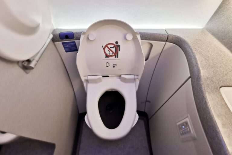 airplane restroom toilet. You'll never guess what happens when you flush an airplane toilet! The answer to this funny question may just surprise you!