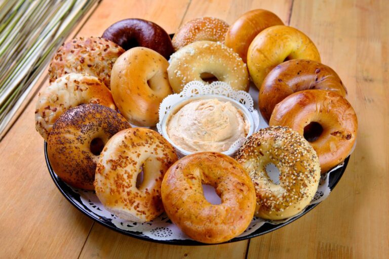 Bagels with cream cheese on a platter. Attention bagel lovers! You NEED to try Rise Bagel Co in Minneapolis - they've got the best bagels in the country!