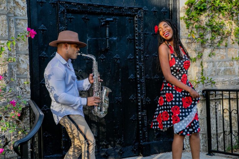 Cuban man playing saxophone as a Cuban woman dances. Step into a Cuban paradise right in Minneapolis at Victor's 1959 Cafe – where every bite takes you closer to Havana!