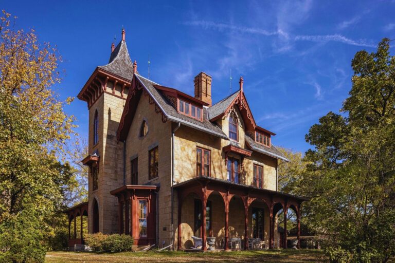LeDuc Mansion on a sunny autumn day. Uncover the chilling secrets of the LeDuc Mansion and Historic Estate in Hastings, Minnesota! A haunted adventure awaits!