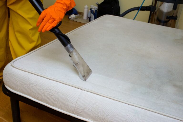 Housekeeper cleaning mattress. You'll never guess what housekeepers have found hidden in hotel rooms! Plus, get the inside scoop on how to leave your room like a pro.