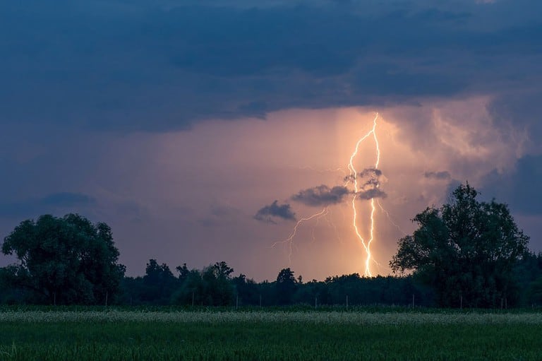 Lightning strike in an Iowa field. Lightning strikes millions of times each year in the Midwest, but you can keep your family safe with these expert tips!