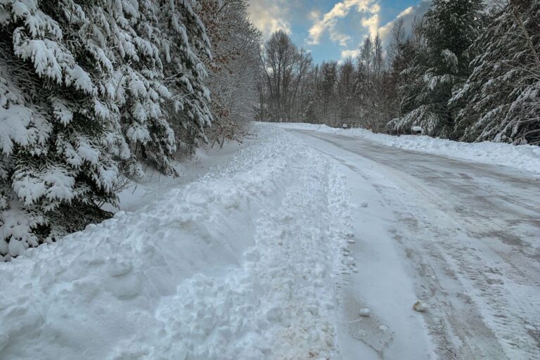 Snow covered highway in Northern Minnesota. Minnesota Has A Secret Road That Runs Through Wisconsin!