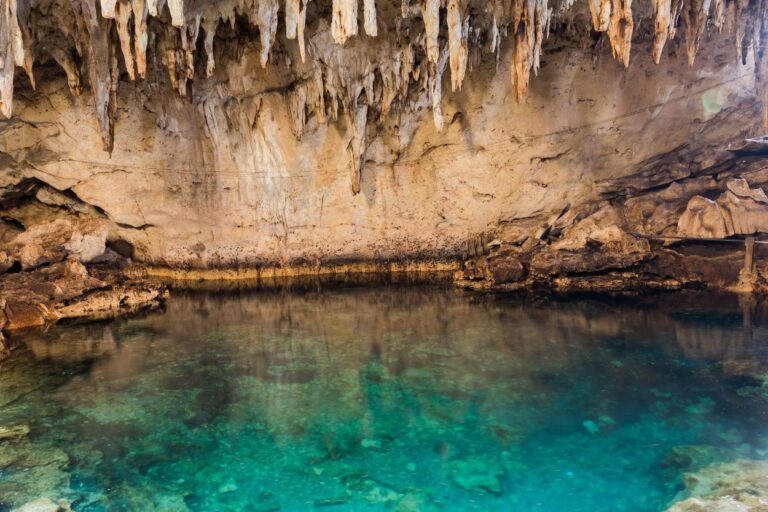 The underground lake at Forestville/Mystery Cave State Park. Are you ready to embark on a journey to Minnesota's hidden cave and discover its enchanting turquoise lake? Don't miss out!