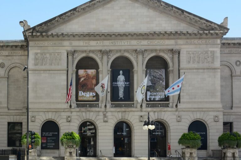 The Art Institute of Chicago exterior on sunny day. Ready to have your mind blown? The Art Institute of Chicago is packed with surprising facts and amazing artworks that will totally SHOCK you!