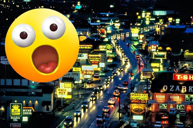 Branson MO main drive with neon signs at night. Shocked emoji Ready for a surprise? Discover the shocking wonders of Branson, Missouri! Nature, entertainment, and fun await!