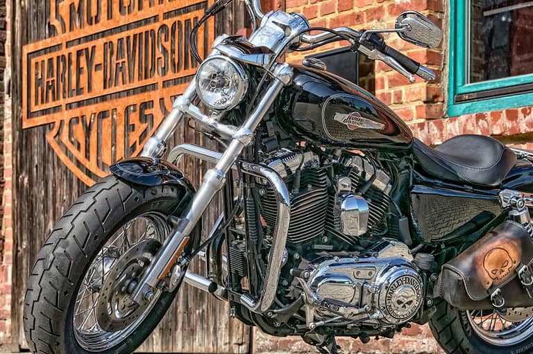 Harley Davidson motorcycle ready to rock and roll! Discover the top ten companies that call Wisconsin home, from the legendary Harley Davidson to the comforting Carmex lip balm!