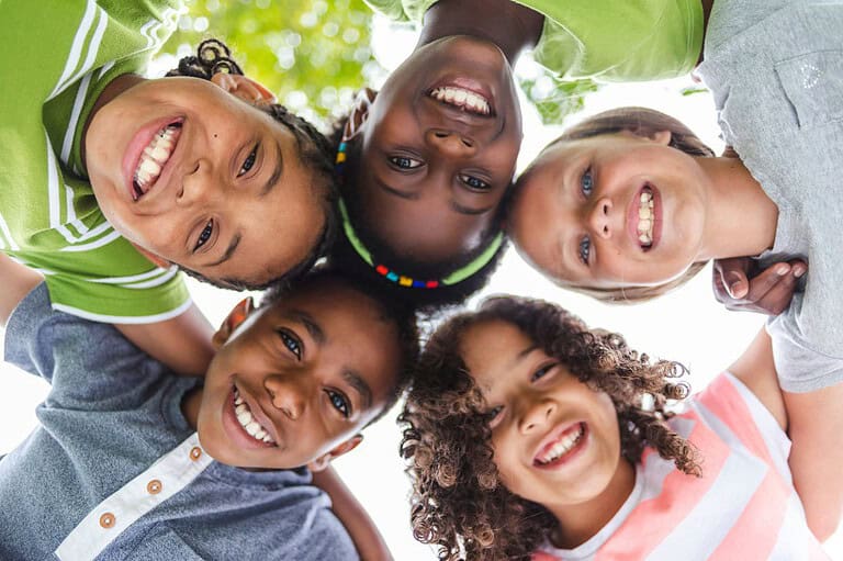Kids laughing. Get ready to LOL with these side-splitting school jokes that every student, parent, and teacher can relate to!