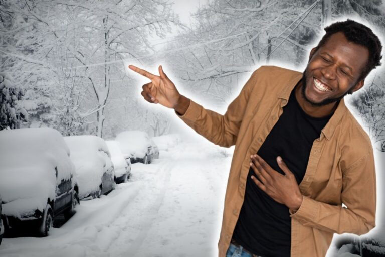 Man laughing during a Minnesota snow storm. Looking for jokes about Minnesota? Uff-da, there's so many, don't cha know! Will you chuckle at these clean Minnesota jokes? You betcha!