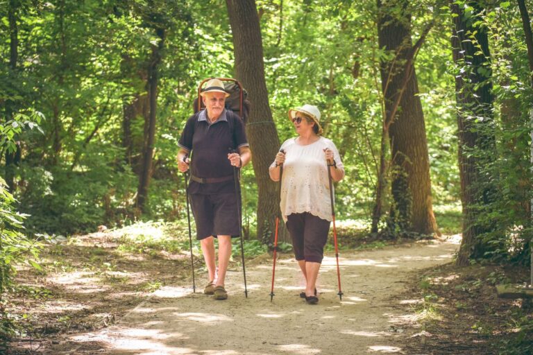 Couple hiking on a Minnesota park trail. Embark on a journey through Minnesota's stunning landscapes and encounter its thriving wildlife - an unforgettable experience awaits!