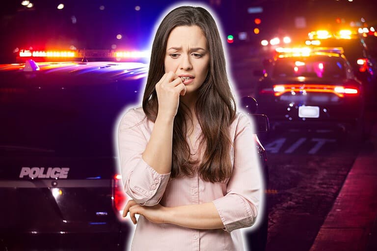 Concerned woman from Missouri with cops in background. Why is Missouri so dangerous? We've got the scoop on the state's high crime rates and what you can do to stay safe.