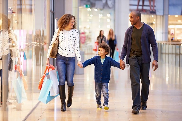 Ohio family having fun shopping at the mall. From sprawling malls to charming boutiques and vintage finds, Ohio's shopping scene is a delightful surprise waiting to be uncovered.