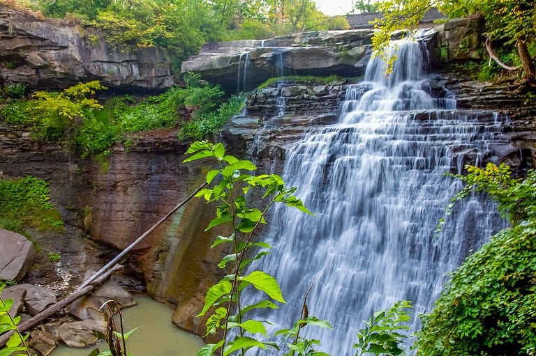 Waterfall at Cuyahoga Valley National Park. Embark on a journey through Ohio's hidden gems and discover the essential adventures that await you in this underrated Midwestern paradise!