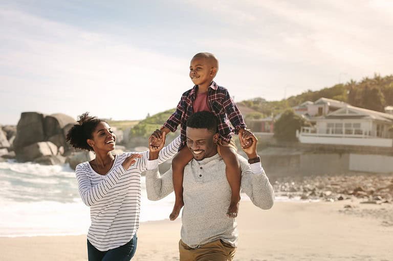 Family having fun at the beach in Ohio. Embark on a year-round adventure in Ohio, where each season brings its own unique charm and exciting activities!