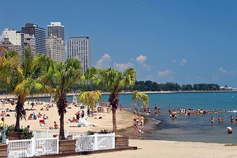 Oak Street Beach in Chicago, IL. This beach just made Travel and Leisure's list of top beaches! Get ready for sun, fun, and city views that will take your breath away.