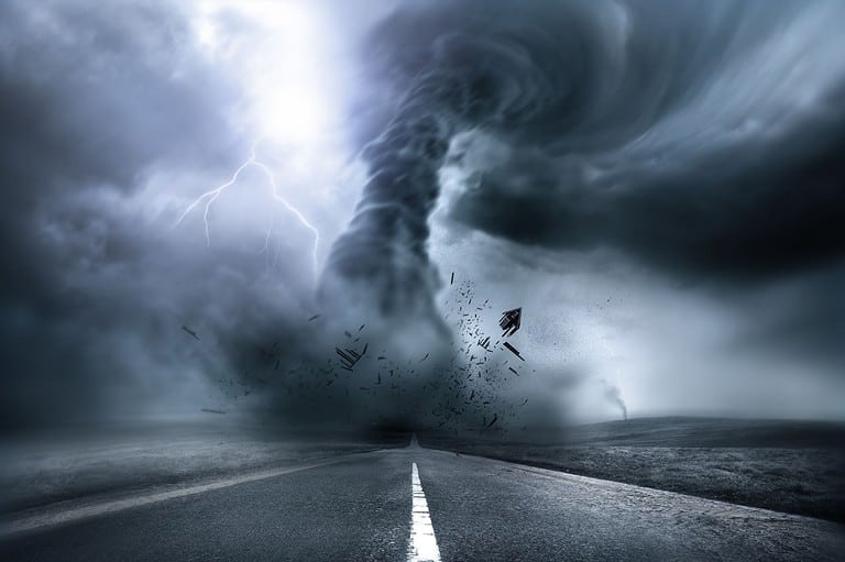 Tornado destroys a road. Think you know everything about tornadoes? Think again! We're busting 10 common tornado myths that will blow your mind. Stay safe!