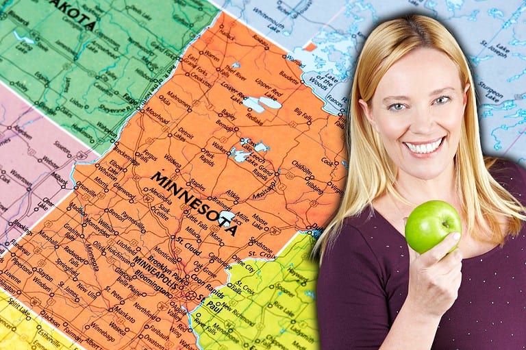 Teacher with apple in front of Minnesota map. Learn yo' alphabet! From Aquavit to Zumbro, discover the quirky, charming, and iconic elements that make Minnesota a one-of-a-kind state.