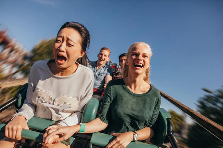 Friends on rollercoaster at Valleyfair. Get ready for a season of thrills, splashes, and unforgettable memories at the biggest amusement park in the Upper Midwest!