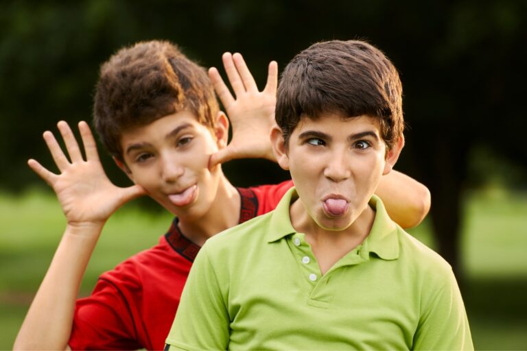 Kids sticking out their tongues. Get ready to laugh (or groan) with the dumbest jokes ever! Try these silly one-liners on your friends today and see who cracks up first!