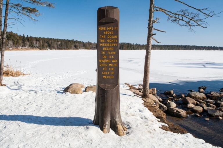 Mississippi River headwaters sign at Lake Itasca. From a humble Minnesota stream to a national treasure, discover the secrets of the Mississippi Headwaters – one of America's natural wonders!