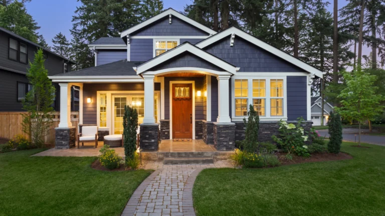 Nice Minneapolis home at dusk with lights on inside. Think you're a polite guest? Think again! Discover the shocking things you should NEVER touch in someone else's home!