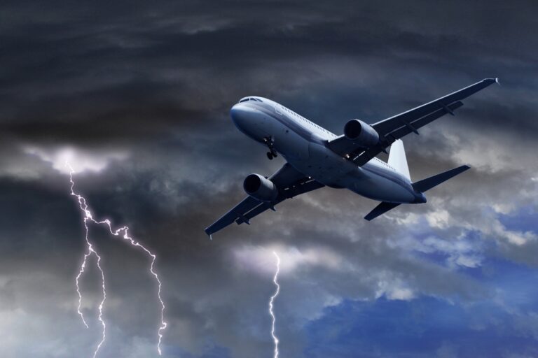 Plane flying through thunder storm. Want to avoid summer travel chaos? Discover why this mistake could be the worst decision you make and how to dodge delays like a pro.