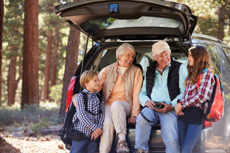 Grandparents on roadtrip with grandkids. Thinking about taking your grandkids on a trip? Discover these game-changing tips to make your vacation unforgettable!