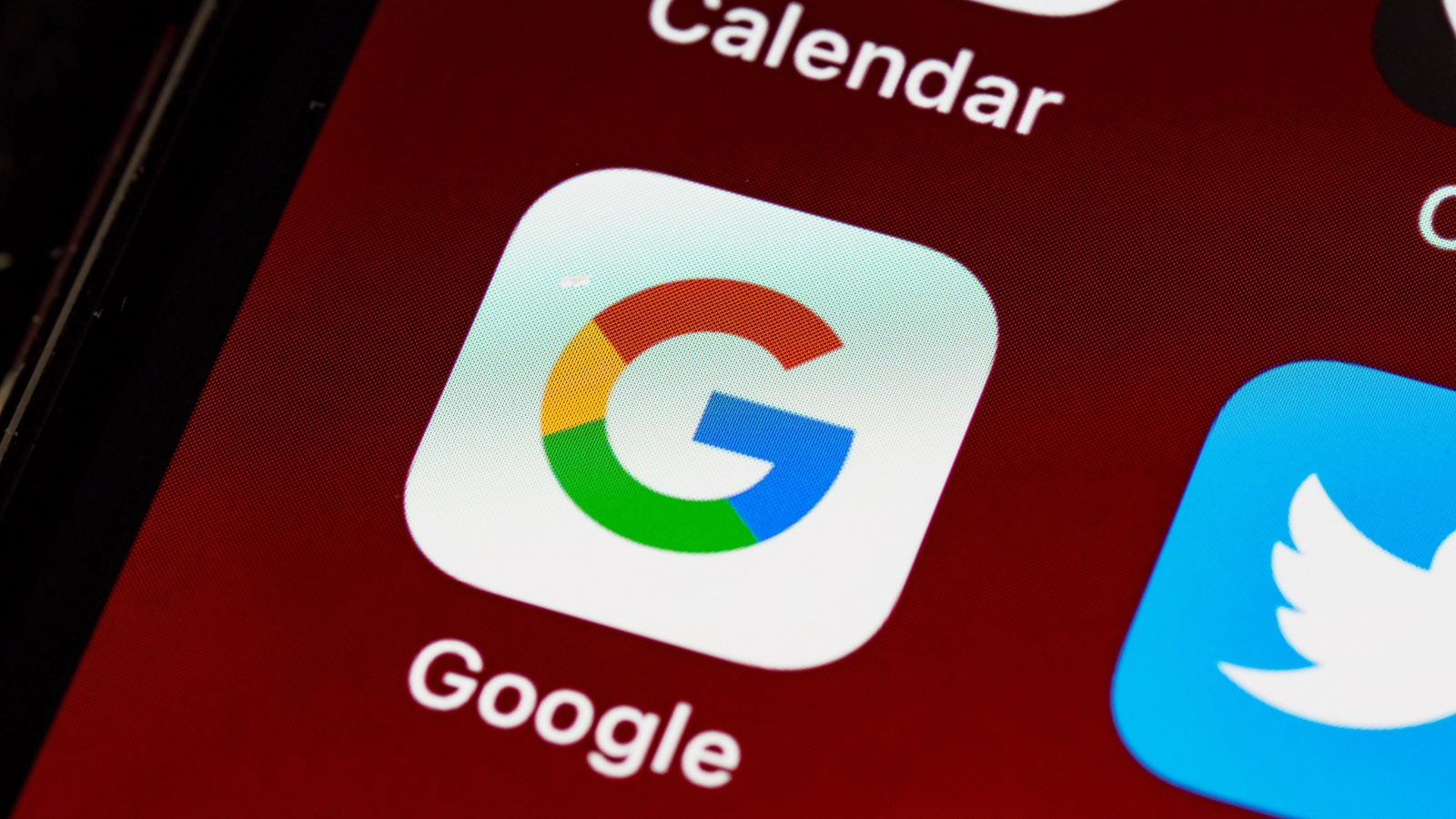 Phone with Google app. Discover the best times to book your Thanksgiving and Christmas flights, according to Google, and save money by acting fast!