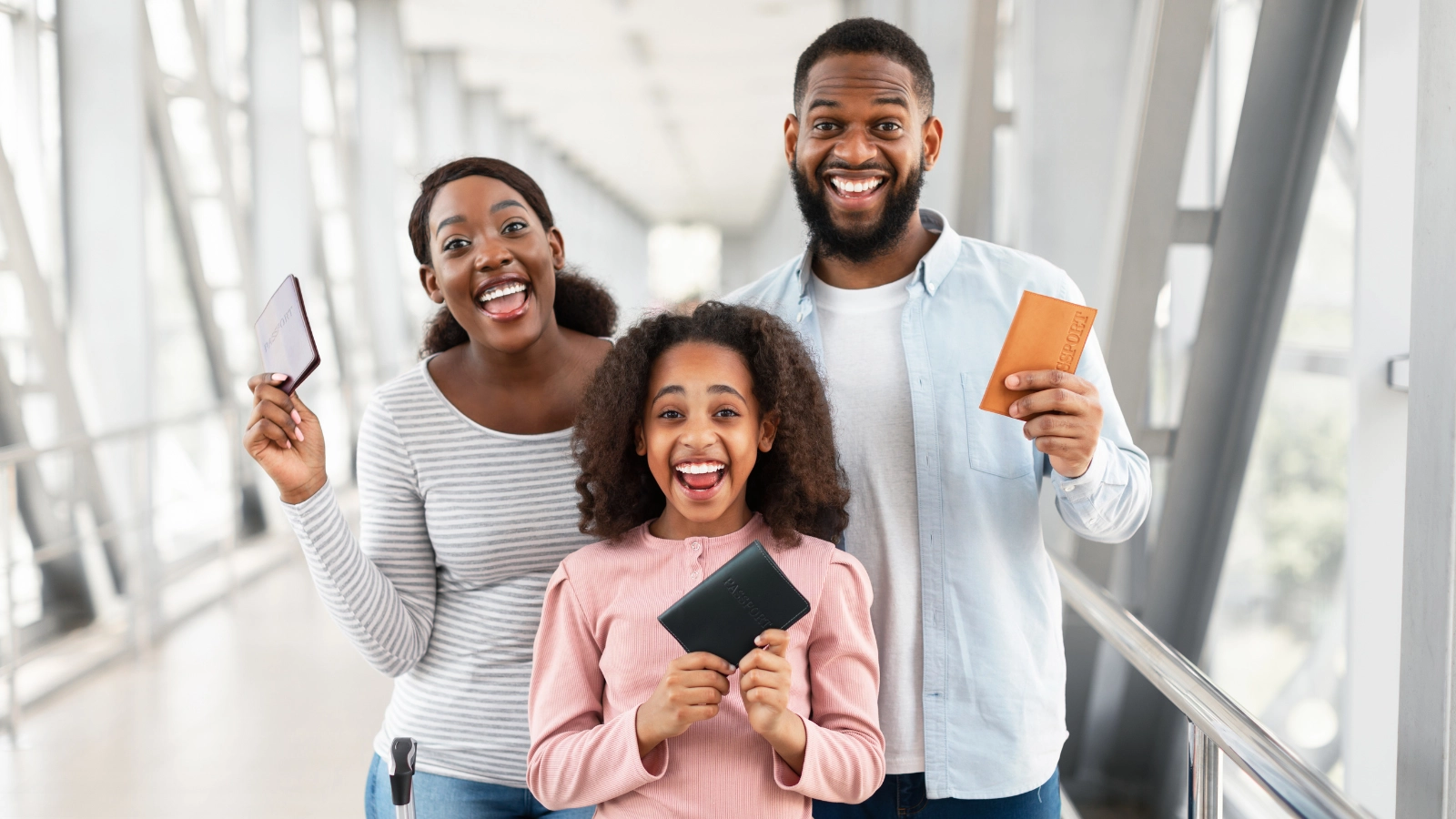 Family with passports. Waiting could cost you hundreds – here’s why booking your holiday flights by mid-October could save you big money and stress!